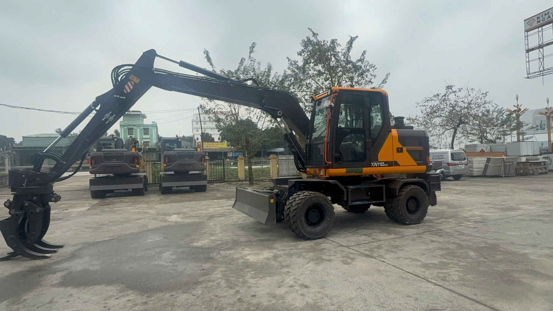 Máy Xúc Đào Bánh Lốp XINIU XN110W-9G